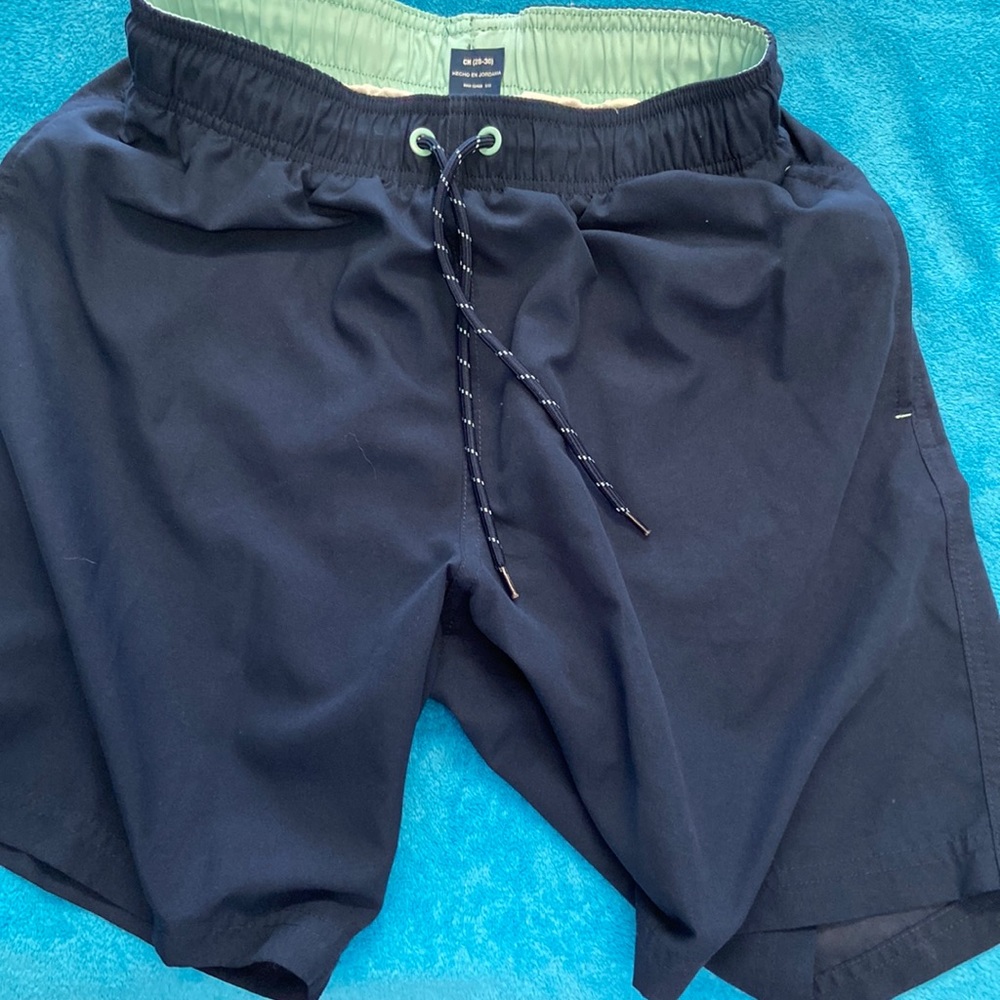 Boys swimwear. Dark blue/mint colors